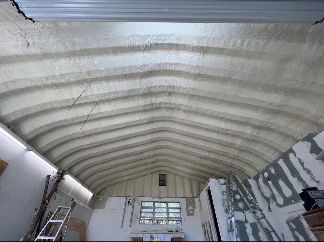 Spray polyurethane foam applied to the underside of a metal roof deck in Castle Pines